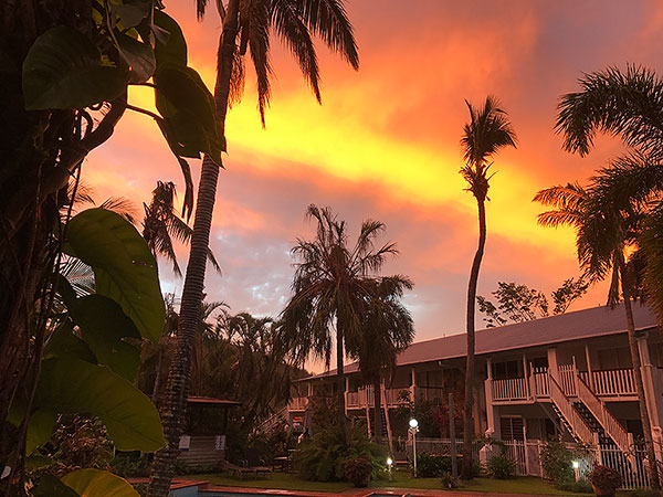 Relaxing around Mango House Resort swimming pool at sunset